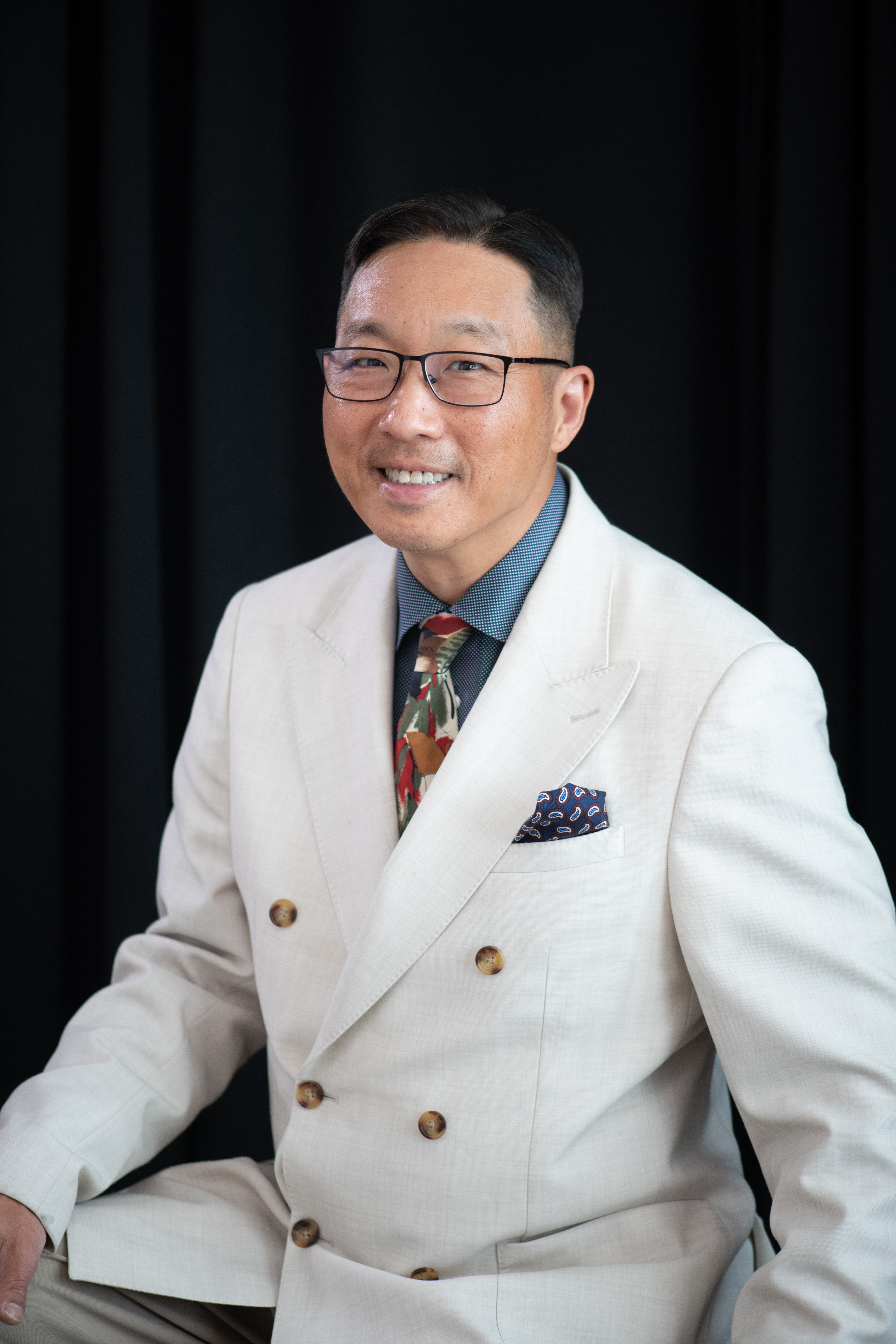 Jason J.J. Park — white suit